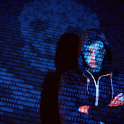 cyber hacker with hooded shirt