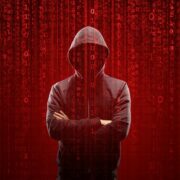 ransomware attacker with hood